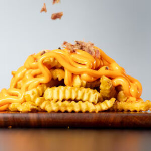 porção de fritas com cheddar e bacon 300g   +cupom delivery